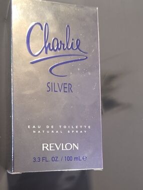 Revlon Silver Box with Blue Barcode Accents